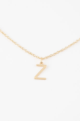 حلق ذهبي نسائي على شكل حرف Z