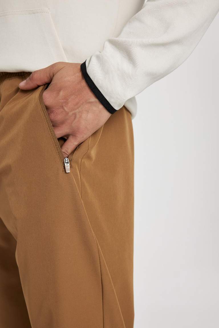 DeFactoFit Slim Fit Çift Cepli Dokuma Sporcu Jogger