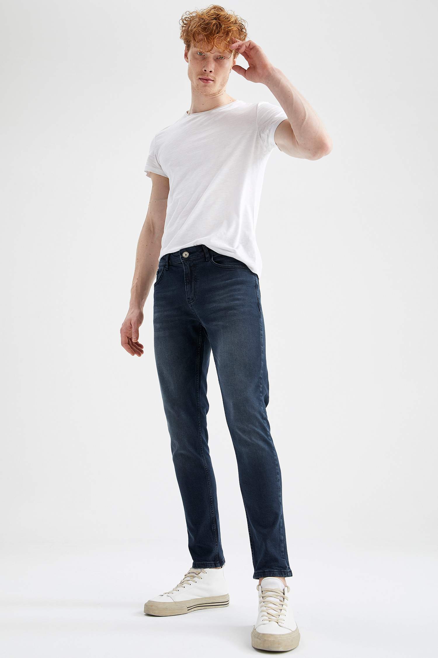 Slim Comfort Fit Normal Bel Dar Paça Yırtık Detaylı Jean Pantolon