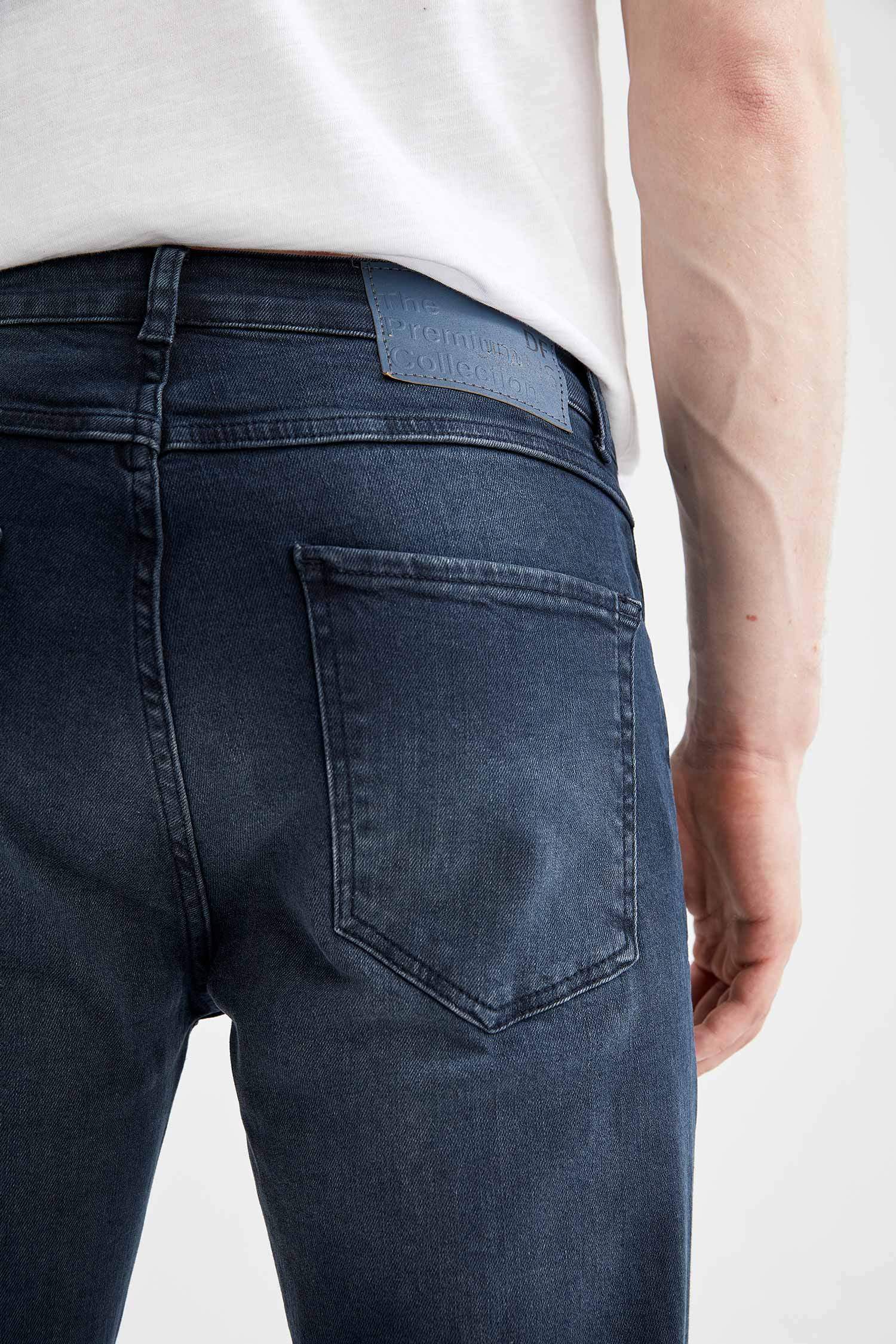Slim Comfort Fit Normal Bel Dar Paça Yırtık Detaylı Jean Pantolon