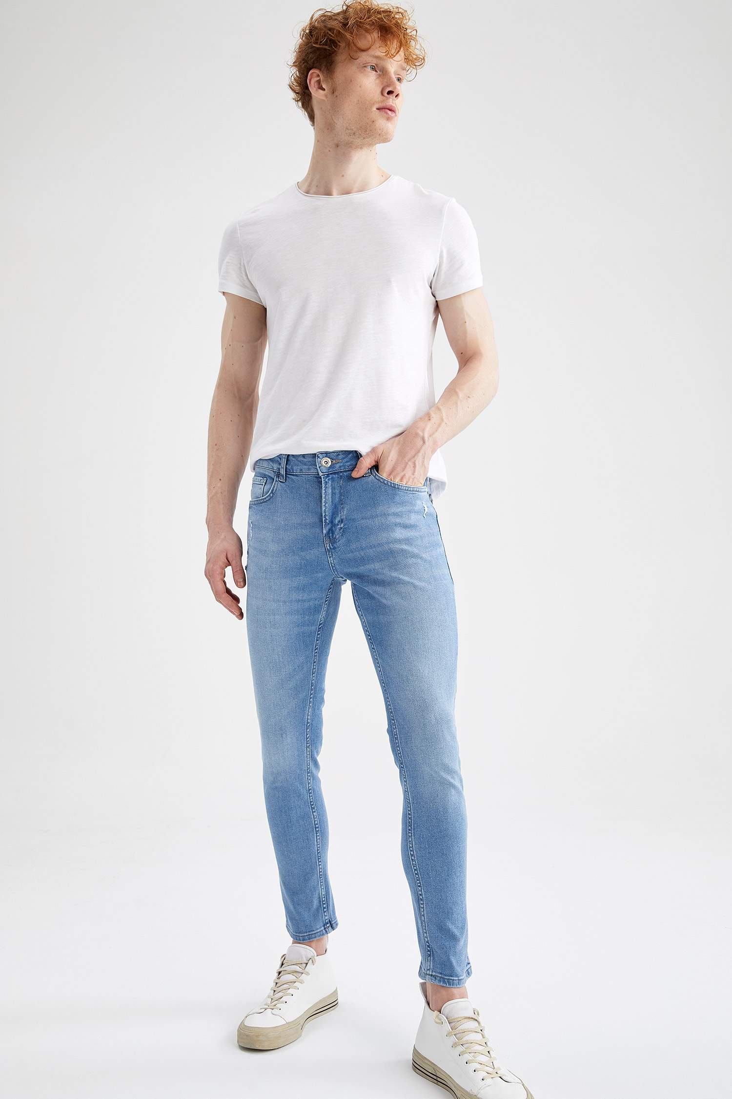 Slim Comfort Fit Normal Bel Dar Paça Yırtık Detaylı Jean Pantolon