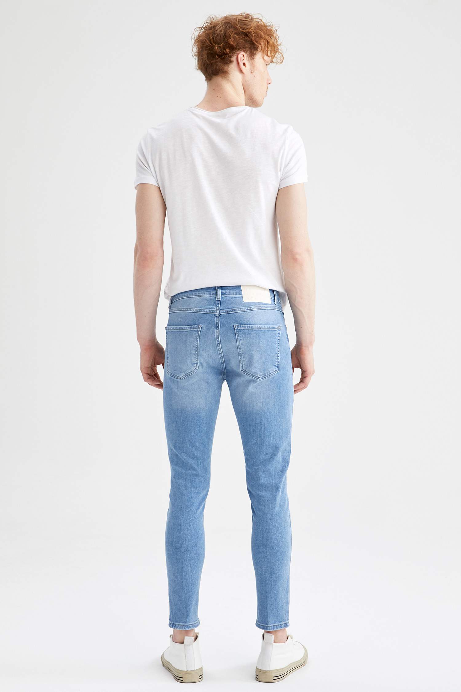Slim Comfort Fit Normal Bel Dar Paça Yırtık Detaylı Jean Pantolon