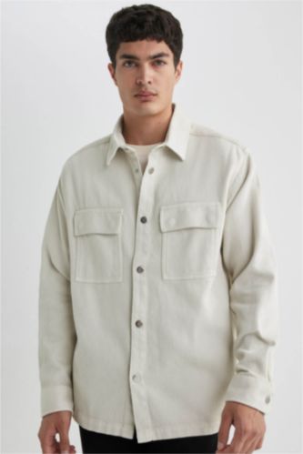 قميص بولو كم طويل قصة مريحة