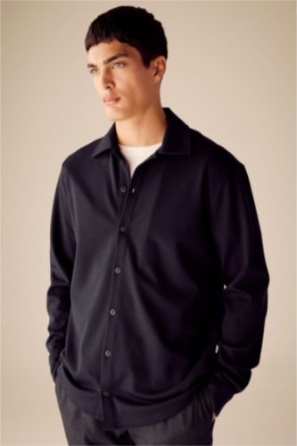 قميص بولو ردن طويل قصة عادية