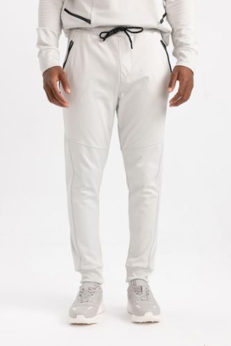 DeFactoFit Sporcu Jogger Eşofman Altı Slim Fit Dar Kesim Skuba Dalgıç Kumaş Beli Bağcıklı Lastikli Paça Cepli