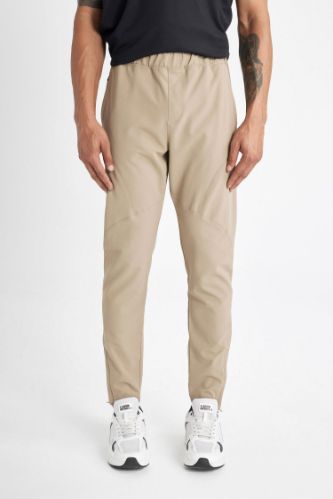 DeFactoFit Sporcu Jogger Eşofman Altı Slim Fit Dar Kesim Dokuma Üç Cepli Fermuarlı Paça