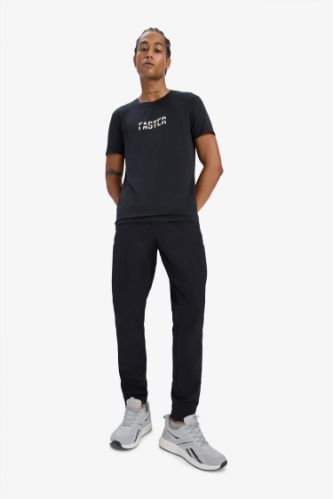 DeFactoFit Esnek Kumaş Sporcu Jogger Eşofman Altı Slim Fit Dar Kesim Dokuma Üç Cepli Fermuarlı Paça