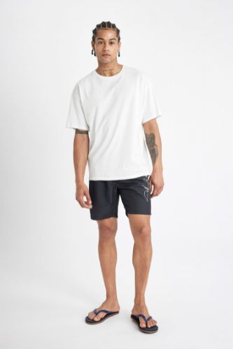 Short de bain court homme sale