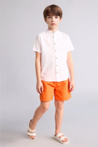 أولاد برتقالي شورت بحر بيزك