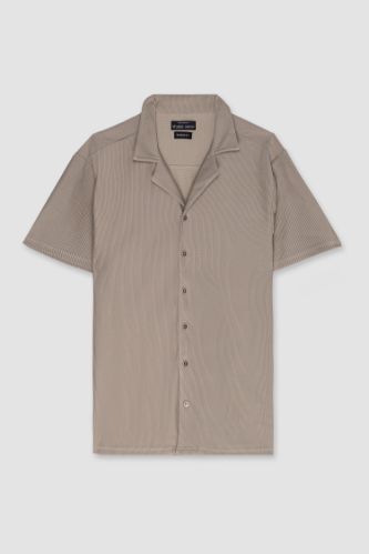 قميص بولو نص كم محبوك مودرن فيت