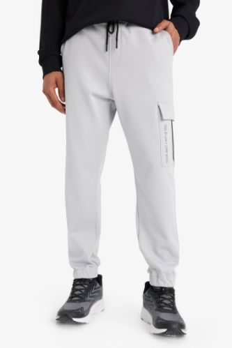 DeFactoFit Sporcu Jogger Eşofman Altı Standart Fit Üç Cepli Beli Bağcıklı Lastikli Paça