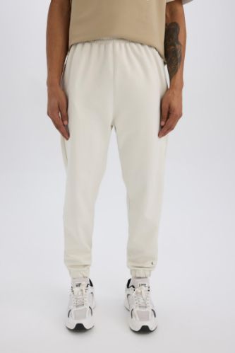 DeFactoFit Sporcu Jogger Eşofman Altı Standart Fit Basic Düz Cepli Beli Paçası Lastikli