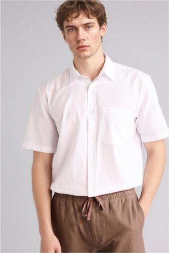 Man White قميص بيزك سادة قطن