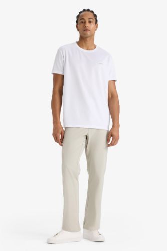 DeFactoFit Slim Fit Dar Kesim Standart Paça Dokuma Sporcu Pantolon