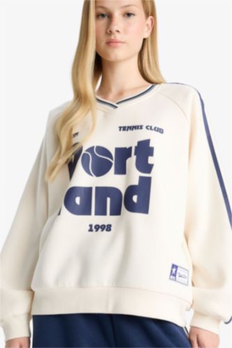 سويت شيرت مطبوع اوفر سايز بياقة V