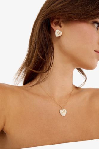 سيت نسائي تراجي وقلادة باحجار ابيض