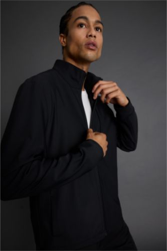 كارديجان قصة عادية بياقة عالية بجيب فليتو