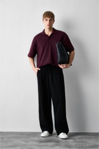 Man Black Barrel Fit Trousers