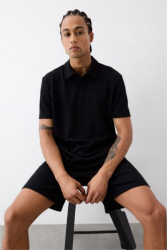 تيشيرت بولو رياضي منسوج قصة عادية من DeFactoFit