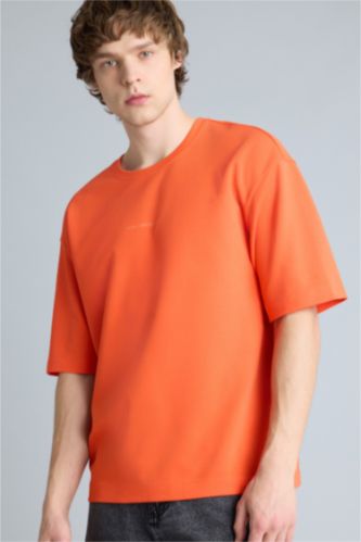 Ерлер қызғылт сары Тыныс алатын Boxy Fit баспалы футболка