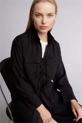 حريمي أسود قميص كم طويل قصة عادية