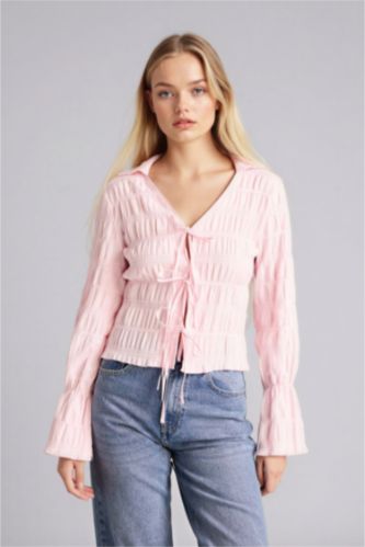 حريمي زهري فاتح بلوزة كم طويل قصة عادية بياقة قميص