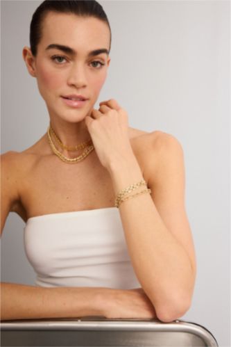 WOMAN GOLD اسورة حريمي - قطعتين