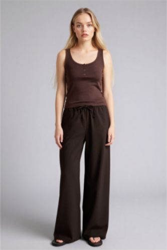 نساء بني سروال واسع بخصر عادي وجيوب