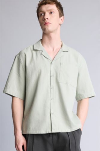 Erkek Açık Mavi Boxy Fıt Apaş Yaka Dokuma Kısa Kollu Gömlek