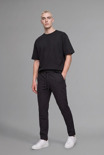 MAN Black Relaxed Fit Straight Leg Trousers