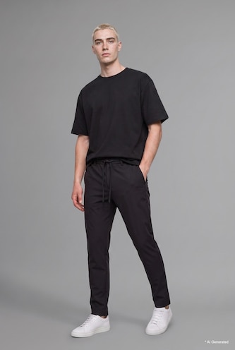 MAN Black Relaxed Fit Straight Leg Trousers