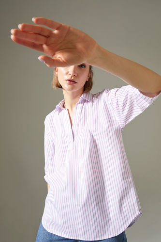 Смугаста блуза з сорочковим коміром та декор. елементами на плечах
