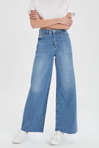 Джинсові штани вайд-леґ з потертостями в стилі ґранж