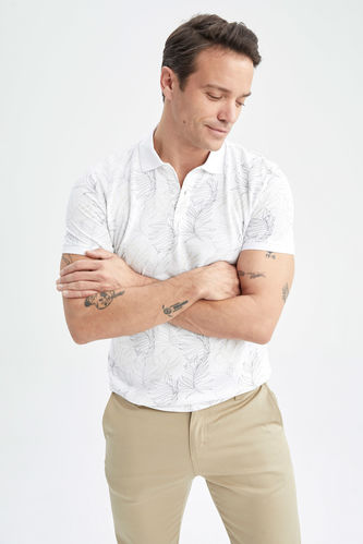 T-shirt slim à manches courtes et à motif floral à col polo
