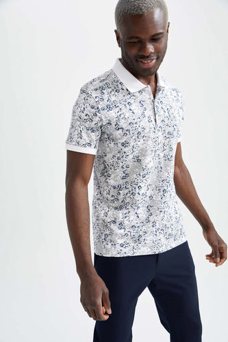 T-shirt ajusté à manches courtes à motif floral et col polo