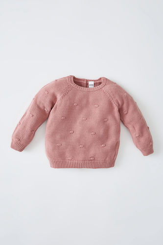 Трикотажний пуловер рожевого кольору