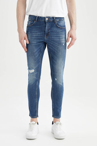 Pantalon en jean skinny coupe confort taille normale jambe étroite déchiré