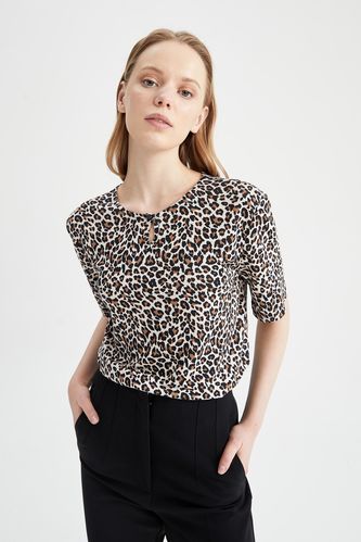 T-shirt à manches courtes coupe décontractée à col ras du cou et motif léopard