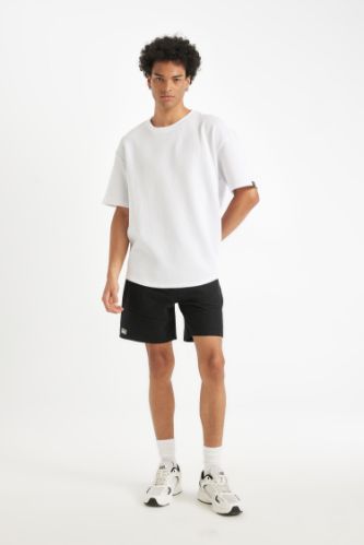 Black MAN Slim Fit Slim Leg Shorts 2762425 | DeFacto