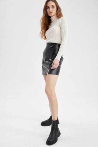 Black WOMAN A Cut Faux Leather Mini Skirt 2372473 | DeFacto