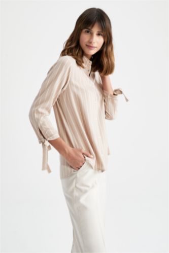 Chemise traditionnelle à rayures et nœuds coupe classique