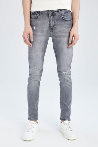 Super Skinny Normal Bel Dar Paça Yırtık Detaylı Jean Pantolon