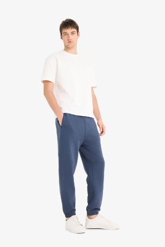 Regular Fit Beli Bağcıklı İçi Yumuşak Tüylü Paçası Lastikli Baskılı Fermuar Cepli Eşofman Altı