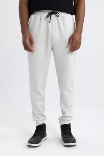 DeFactoFit Slim Fit Sporcu Jogger Eşofman Altı Dar Kesim Skuba Dalgıç Kumaş Standart Paça Beli Bağcıklı Lastikli Paça
