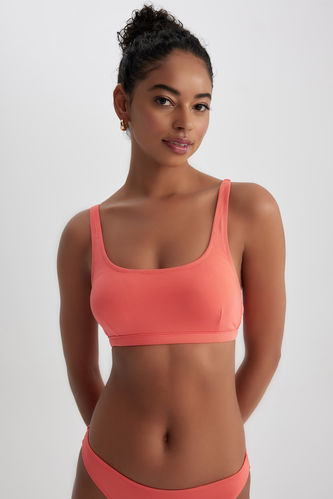 Bikini top and sports top for women in peach color