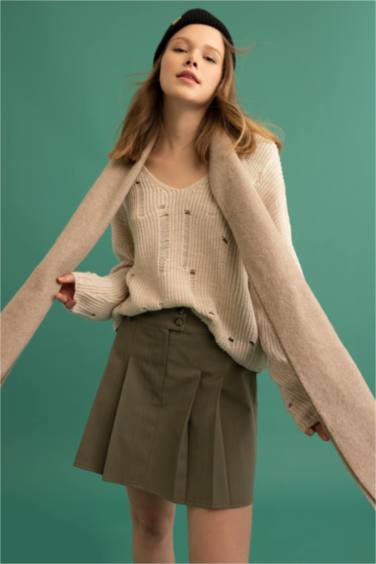 Mini-jupe plissée en gabardine coton