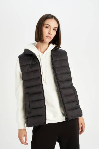 Stand Collar Quilted Pocketed Waterproof Puffer Vest