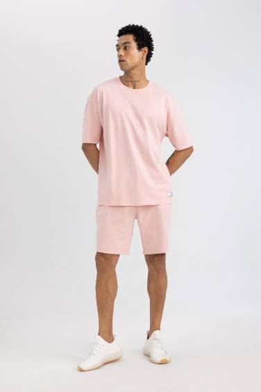 شورت قصير سليم فيت بينك من DeFactoFit