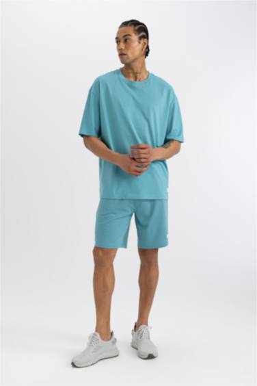 شورت قصير سليم فيت بجيب مزدوج من DeFactoFit