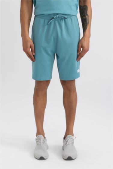 شورت قصير سليم فيت بجيب مزدوج من DeFactoFit